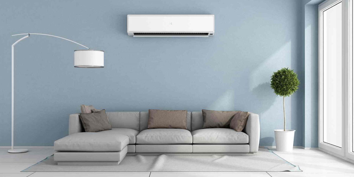 Person using air conditioner remote control